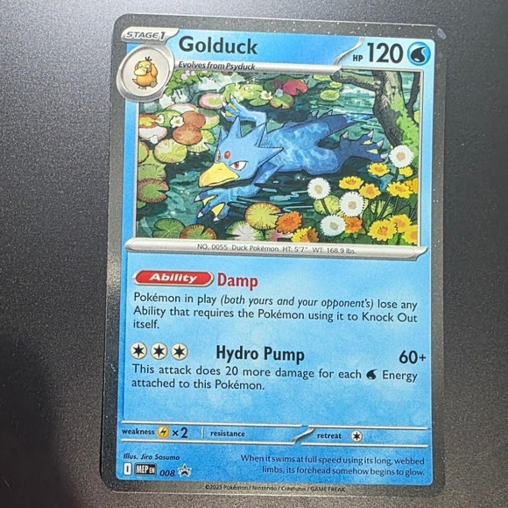 Golduck 008 MEP Promo Black Star Cosmos Holo Pokemon Card NM
